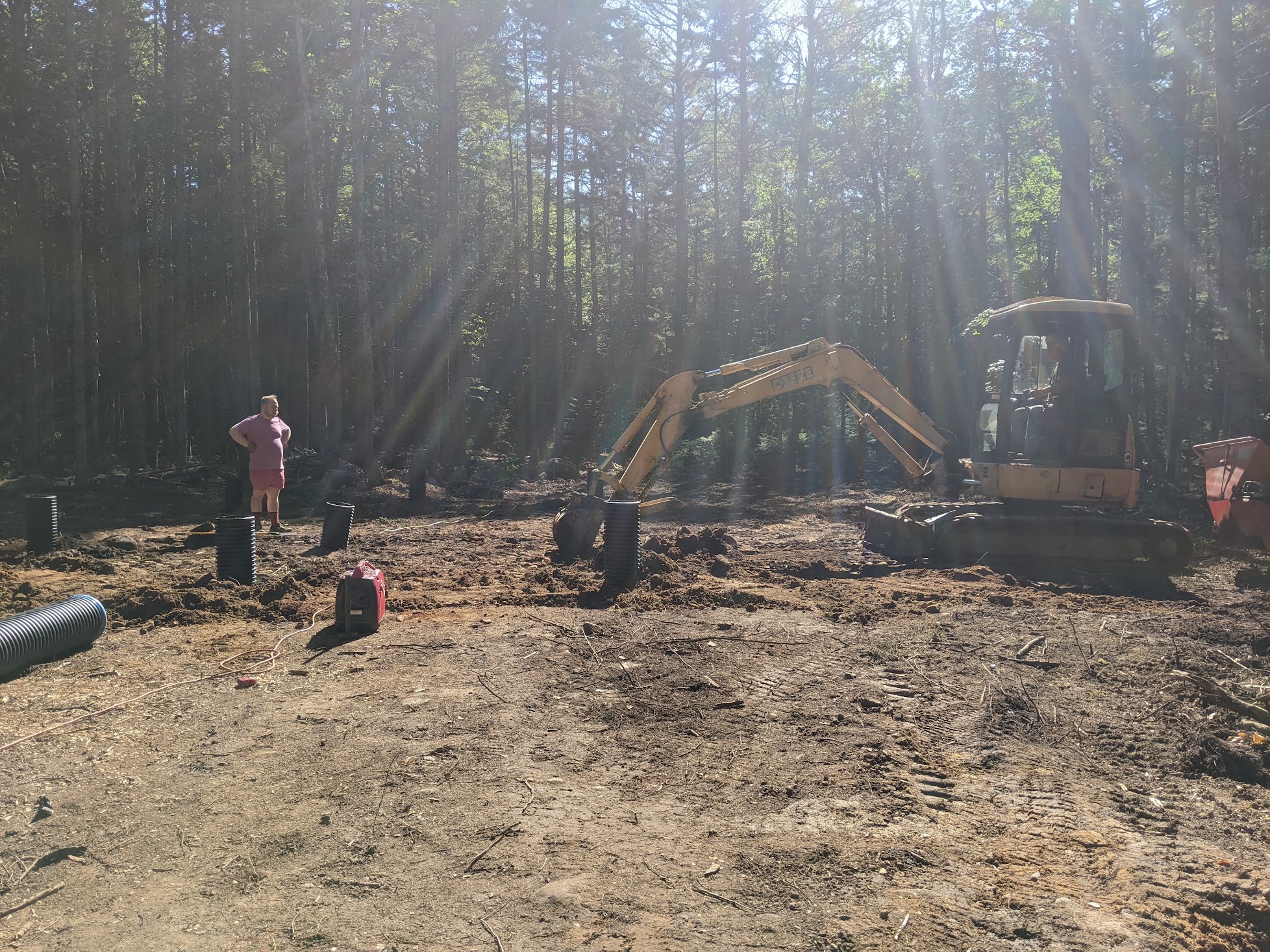 Starting to dig the piers for the pavilion foundation